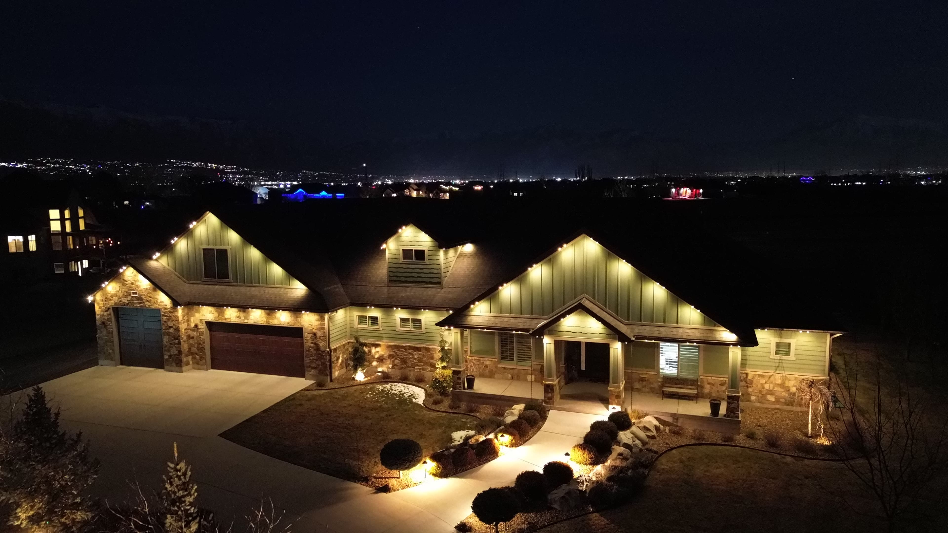 TruLight permanent lighting on luxury stone home