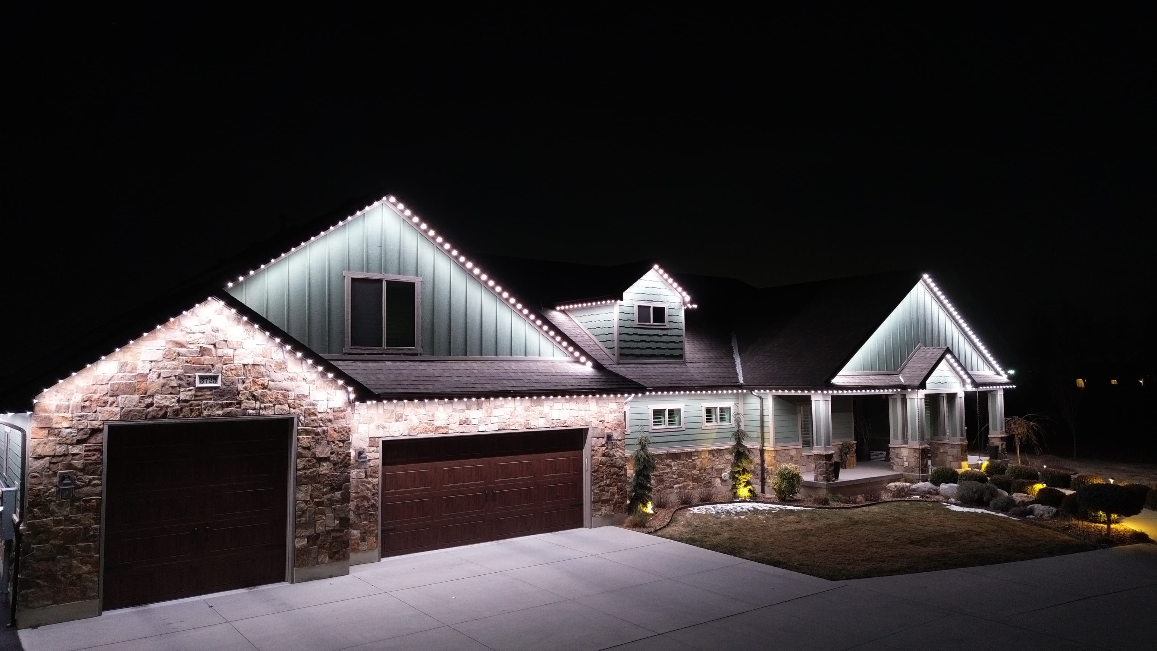 Security lighting illuminating a Salt Lake City home at night